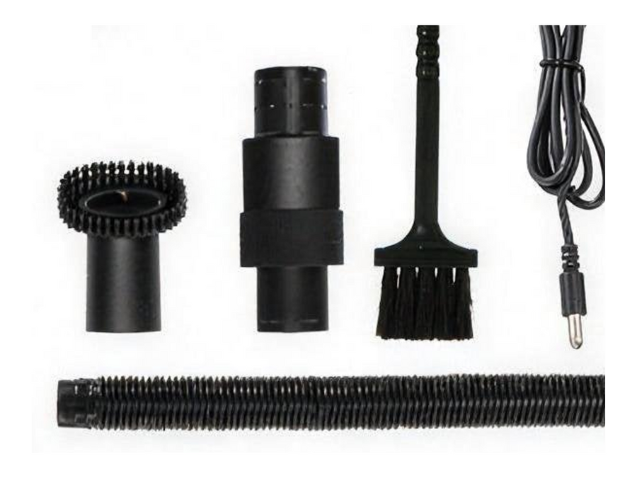 The vacuum attachments laid out: brush head, crevice nozzle, dust brush, charging cable and flexible extension hose